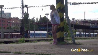 Blonde teen desperate for some golden shower in public train station - sexu.com - Czech