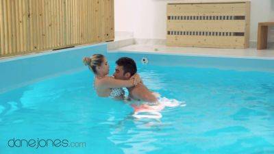 Irina Cage gets her shaved pussy licked and creampied in public pool by Dane Jones - sexu.com