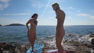 Brille And Poppy Doing Nude Yoga On A Public Beach While On Vacation - hotmovs.com